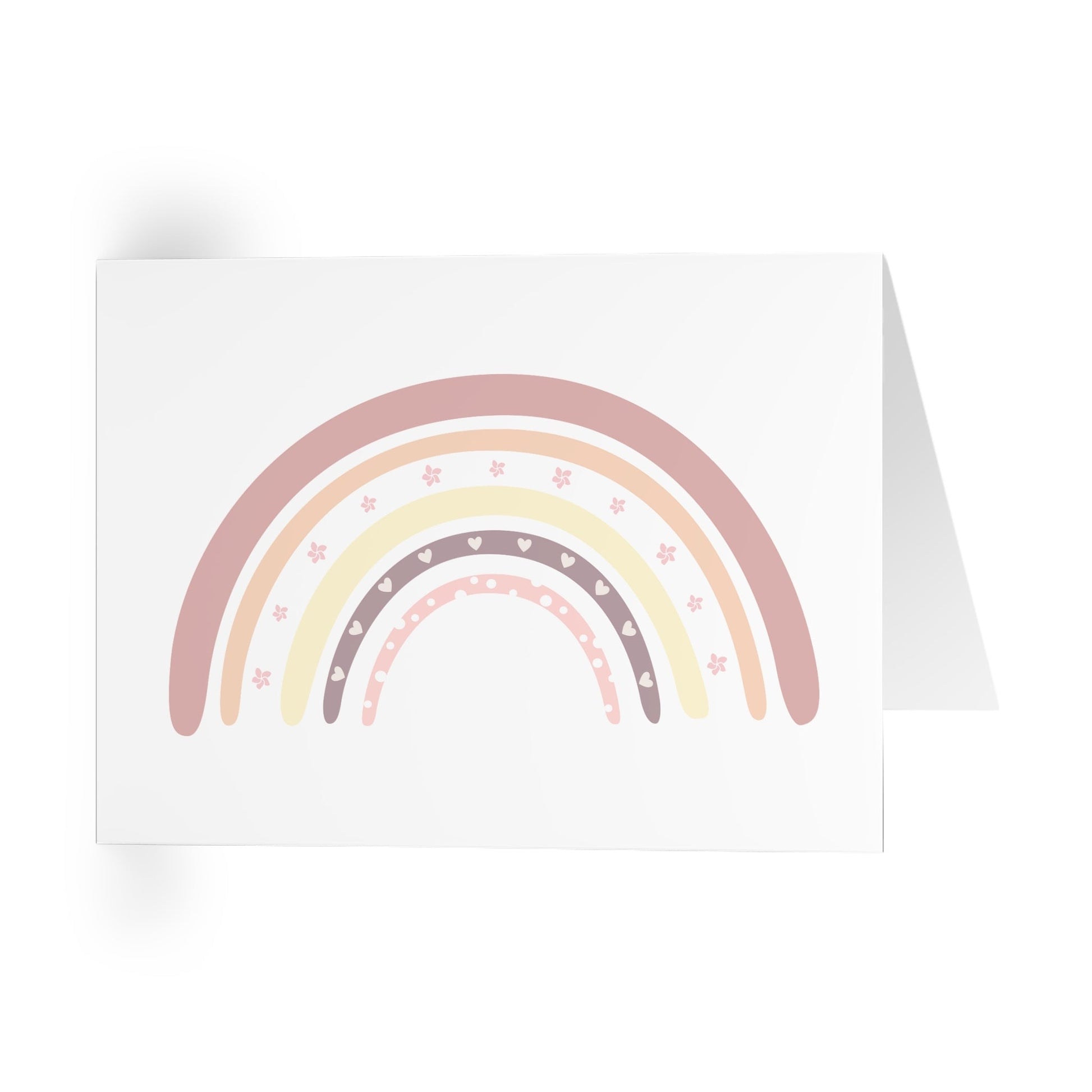 Pink and yellow rainbow greeting card with sending you rainbows as sentiment.
