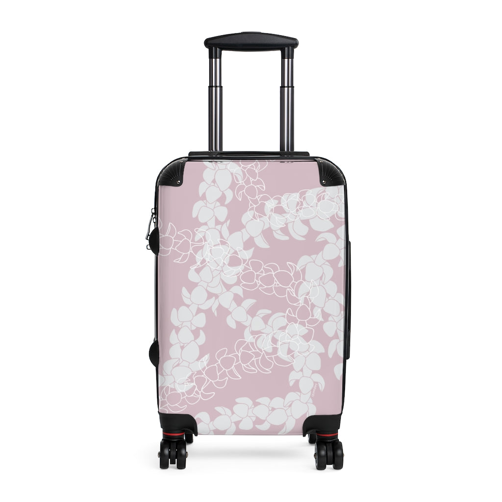 Rolling, hard shell carryon luggage with pink and white Puakenikeni flower lei design.