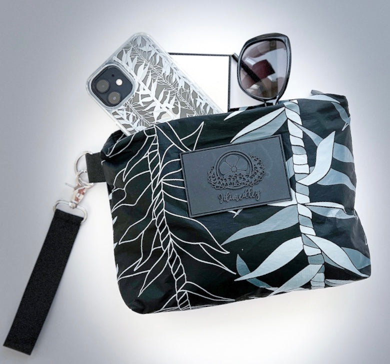 Black_ti_leaf_tyvek_accessory_pouch_with_wristlet_strap